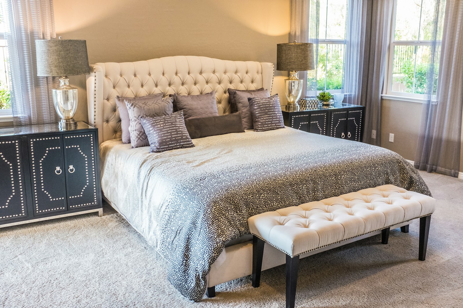 Top-fill humidifier on a bedside table in a real bedroom.